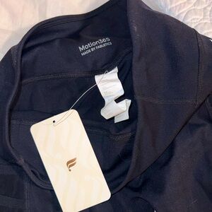 Size 7/8 Black Fabletics Trinity mid-rise pocket leggings